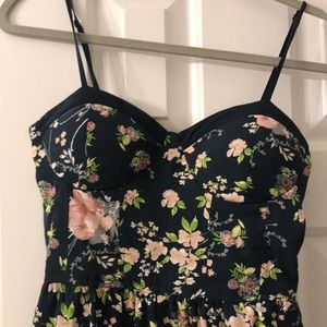 Floral jumper with adjustable straps. Bustier style front. By Band of Gypsies